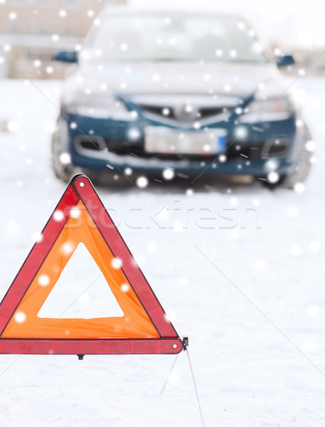 closeup of warning triangle and car Stock photo © dolgachov