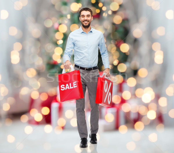 幸せ 男 ショッピングバッグ クリスマス ライト 人 ストックフォト © dolgachov
