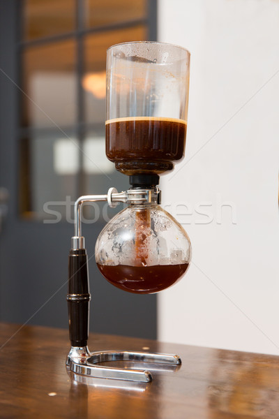 close up of siphon vacuum coffee maker at shop Stock photo © dolgachov