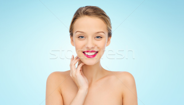 Glimlachend jonge vrouw roze lippenstift lippen schoonheid Stockfoto © dolgachov
