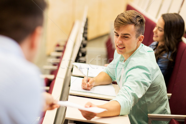 teacher giving test to student boy on lecture Stock photo © dolgachov