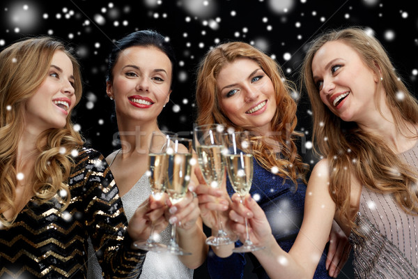 Feliz mujeres champán gafas club nocturno celebración Foto stock © dolgachov