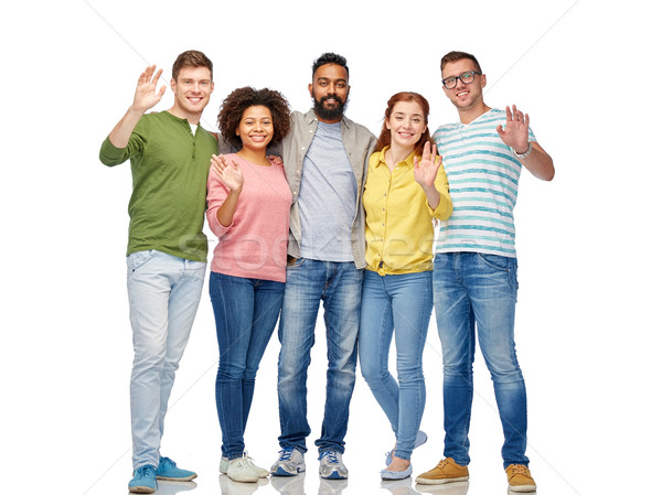 international group of happy people waving hands Stock photo © dolgachov