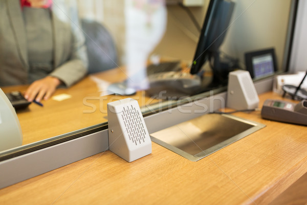 clerk at bank office or currency exchanger Stock photo © dolgachov