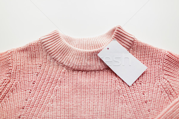 close up of sweater or pullover with price tag Stock photo © dolgachov
