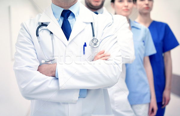 close up of medics or doctors at hospital corridor Stock photo © dolgachov