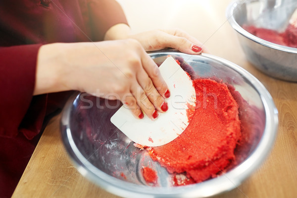 chef making macaron batter at confectionery Stock photo © dolgachov