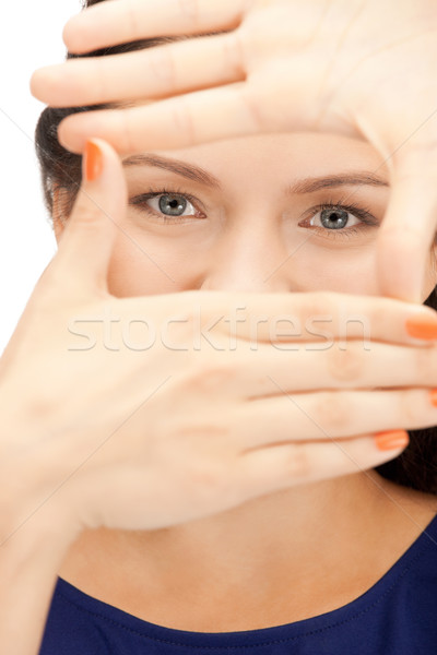lovely woman creating a frame with fingers Stock photo © dolgachov
