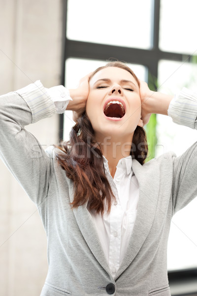 woman with hands on ears Stock photo © dolgachov