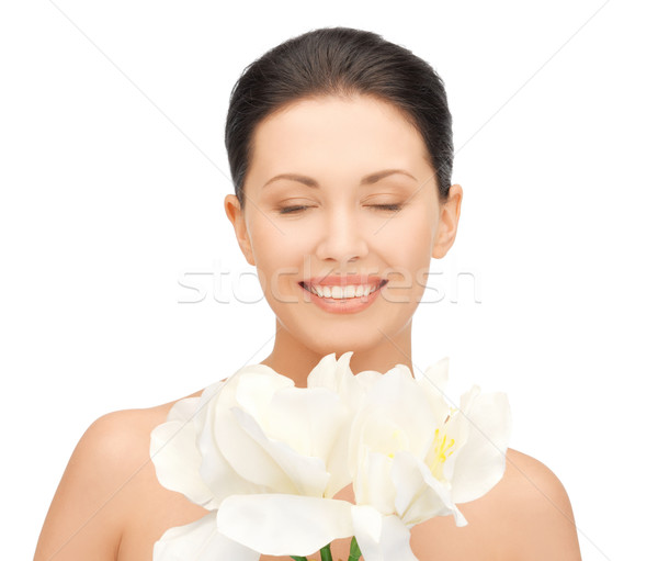 Stock photo: lovely woman with orchid flower