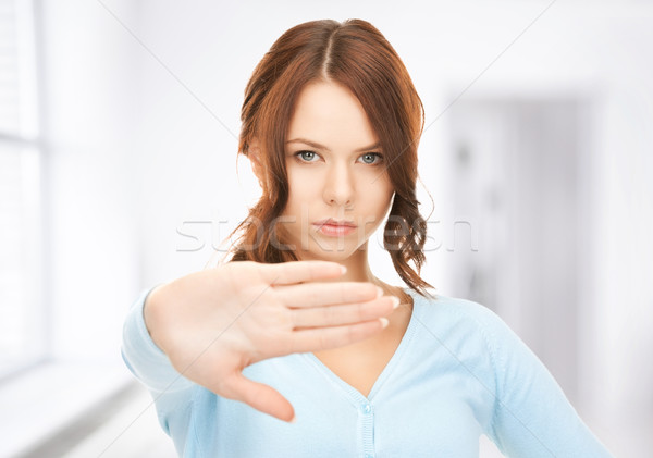 Stock photo: woman making stop gesture