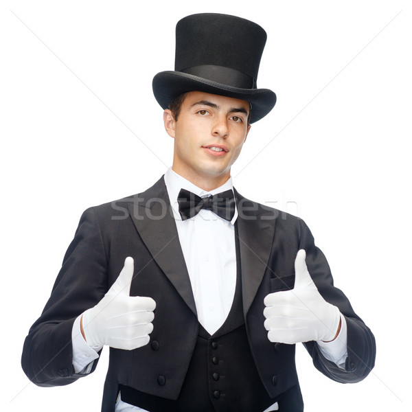 magician in top hat showing thumbs up Stock photo © dolgachov