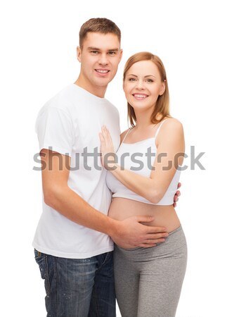 Fericit tineri familie copil sarcină Imagine de stoc © dolgachov
