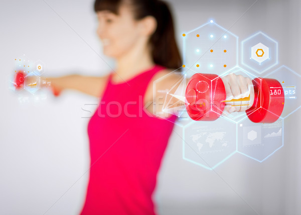 Sportos nő kezek fény piros súlyzók Stock fotó © dolgachov
