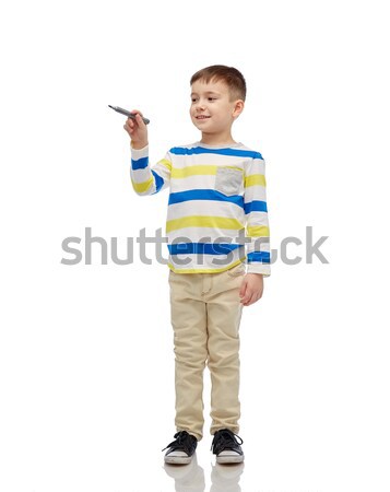 Stock photo: little boy in casual clothes showing OK gesture