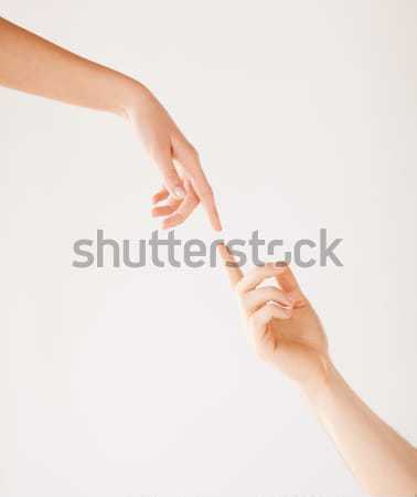Donna uomo mani mano amici Foto d'archivio © dolgachov
