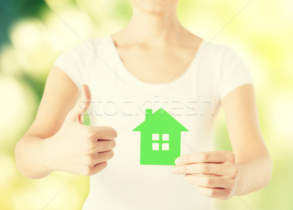 woman hands holding green house Stock photo © dolgachov
