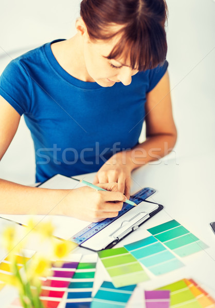 woman working with color samples for selection Stock photo © dolgachov