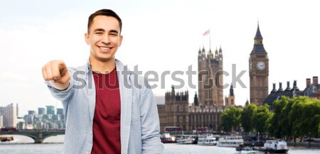 close up of male gay couple with rainbow flags Stock photo © dolgachov