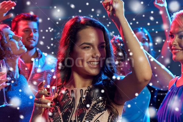 Glimlachend vrienden bril champagne club nieuwjaar Stockfoto © dolgachov