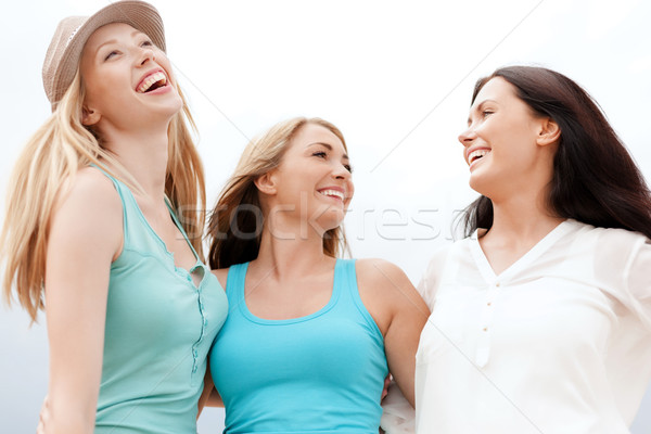 girls looking up in the sky Stock photo © dolgachov