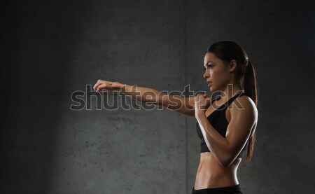 woman boxing in gym Stock photo © dolgachov