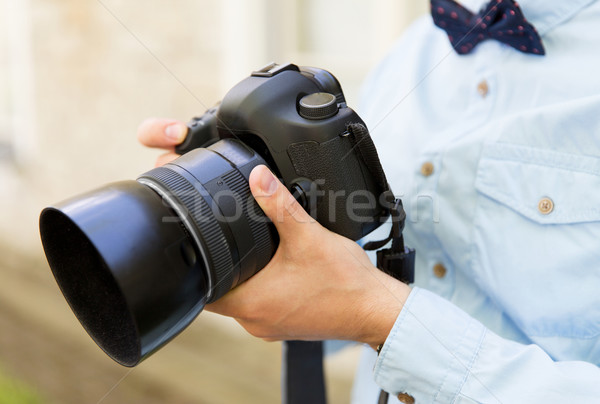 Homme photographe appareil photo numérique personnes photographie Photo stock © dolgachov