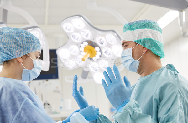 surgeons in operating room at hospital Stock photo © dolgachov