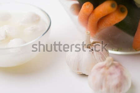 close up of garlic, carrot and mozzarella cheese Stock photo © dolgachov