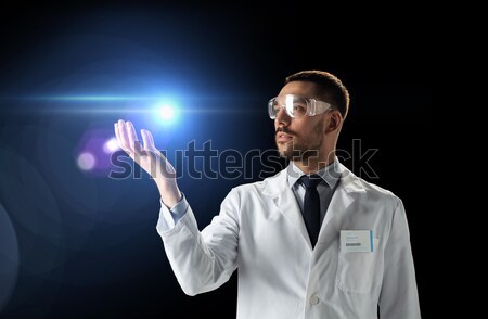 Lekarza naukowiec lab coat okulary ochronne muzyka nauki Zdjęcia stock © dolgachov