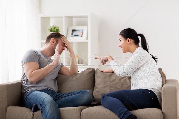 unhappy couple having argument at home Stock photo © dolgachov