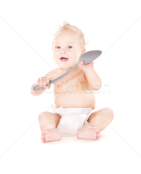 baby boy with big spoon Stock photo © dolgachov