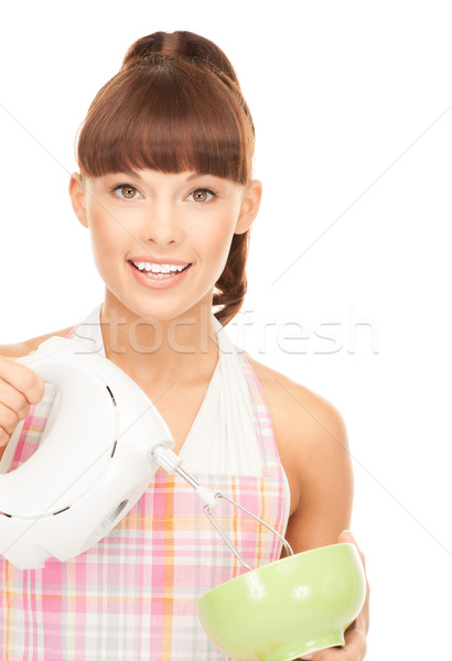 housewife with mixer Stock photo © dolgachov