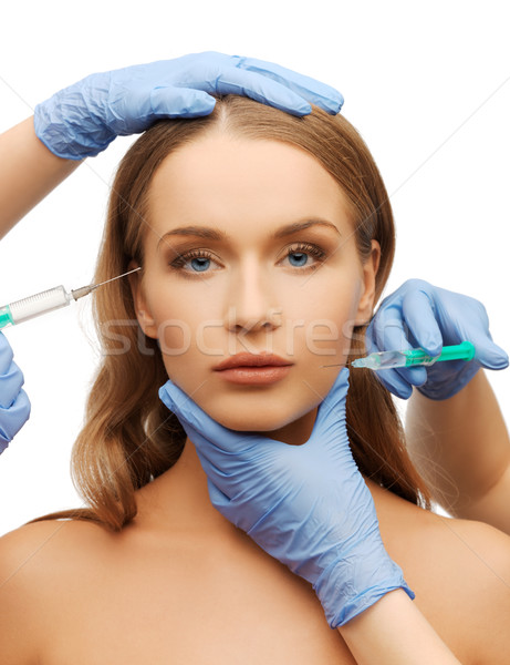 Vrouw gezicht handen spuit cosmetische chirurgie vrouw gezicht Stockfoto © dolgachov