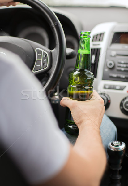 man drinking alcohol while driving the car Stock photo © dolgachov