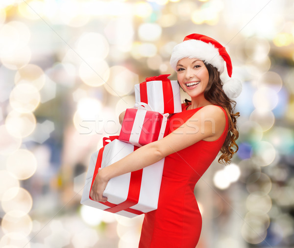 Lächelnde Frau roten Kleid Geschenkbox Weihnachten Feiertage Feier Stock foto © dolgachov