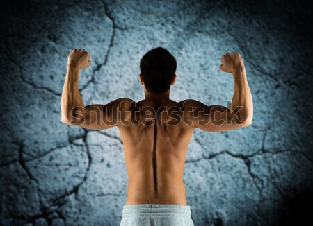 若い男 上腕二頭筋 筋肉 スポーツ ボディービル ストックフォト © dolgachov