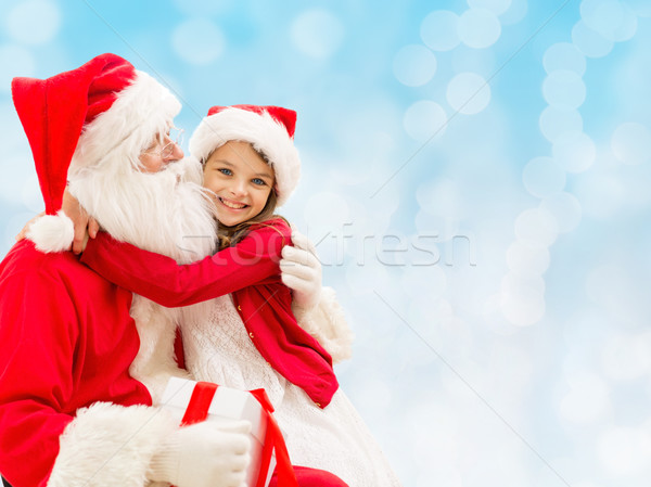 Zâmbitor fetita mos craciun concediu Crăciun copilarie Imagine de stoc © dolgachov