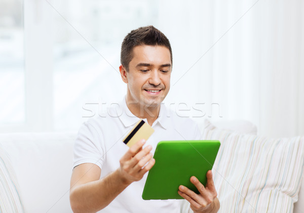 Sonriendo hombre de trabajo casa tecnología Foto stock © dolgachov