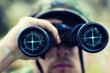 close up of soldier or sniper with gun in forest Stock photo © dolgachov