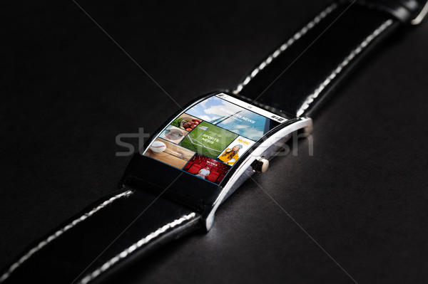 close up of smart watch with internet news Stock photo © dolgachov