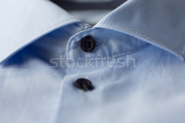 close up of blue shirt collar Stock photo © dolgachov