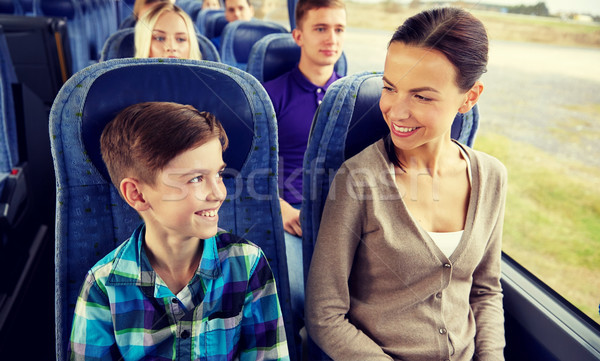 happy family riding in travel bus Stock photo © dolgachov