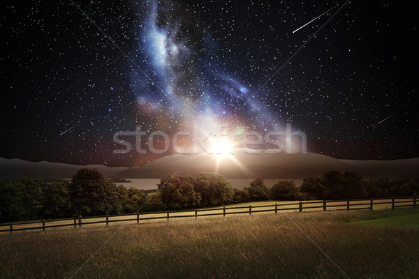 landscape over space and stars in night sky Stock photo © dolgachov