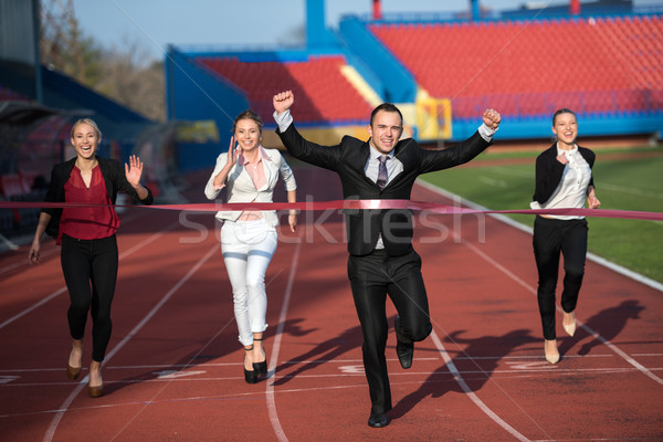 Zakenlieden lopen racing track samen business Stockfoto © dotshock