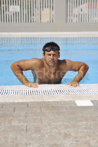 Stock photo: young athlete at swimming pool