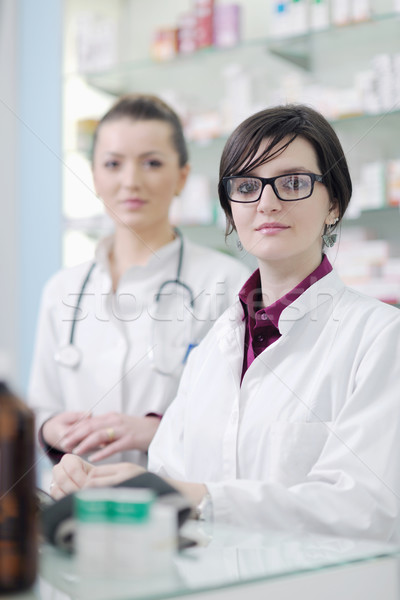 team of pharmacist chemist woman  in pharmacy drugstore Stock photo © dotshock
