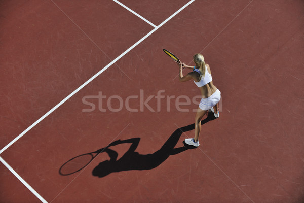 Giocare tennis outdoor giovani montare Foto d'archivio © dotshock