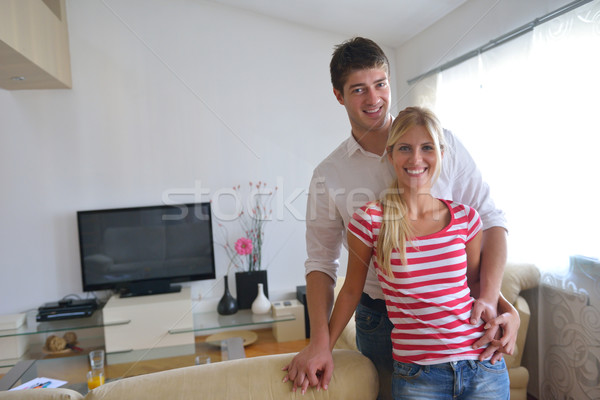 Relaxed young  couple watching tv at home Stock photo © dotshock