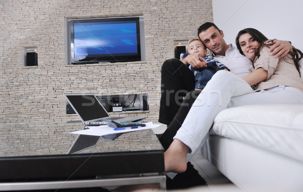 Boldog fiatal család jókedv tv megnyugtató Stock fotó © dotshock